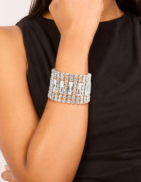 Showcasing a colossal diamantes bracelet in silver with statement styling on wrist view