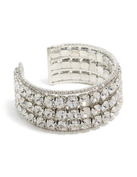 Crafted with radiant diamantes, this large silver wrist cuff features statement bangle design in front view - link has visual effect only