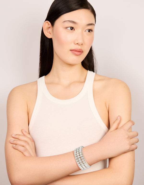 Designed with radiant diamantes, this large silver statement wrist cuff bangle offers a styled on model view