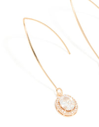 Designed with cubic zirconia, gold dainty circle drop earrings shown in close up view - link has visual effect only