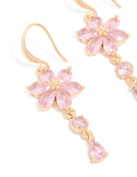 Highlighting gold pink cubic zirconia flower hook earrings close up view - link has visual effect only