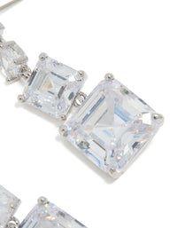 Presenting silver cubic zirconia square drop earrings in close up view - link has visual effect only