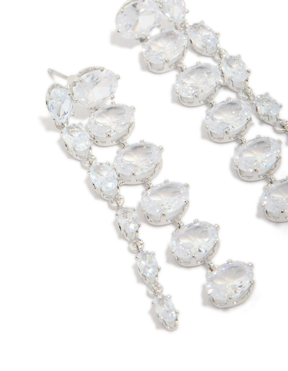 Captivating silver cubic zirconia oval layered drop earrings with light cyan close up view
