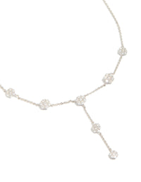Beautifully crafted cubic zirconia mini floral y necklace in dainty silver close up view - link has visual effect only