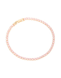 Featuring a gold pink cubic zirconia dainty tennis bracelet in light pink front view - link has visual effect only