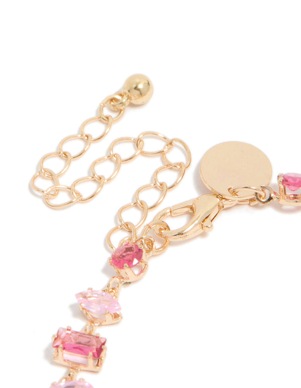 Gorgeous bracelet featuring light pink and hot pink cubic zirconia in a dainty gold design closure detail view