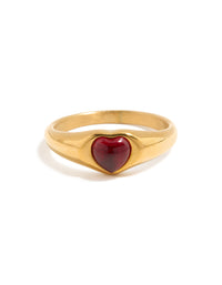 Charming waterproof gold plated stainless steel petite heart ring with crimson stone front view - link has visual effect only