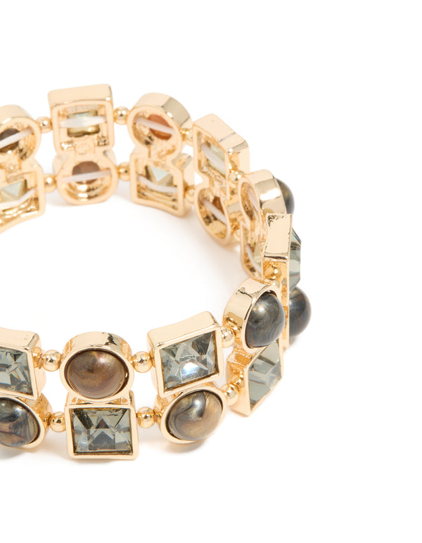 Designed with gold brown acrylic and diamante accents in stretch bracelet close up view