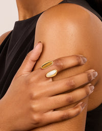 Showcasing a waterproof gold plated stainless steel open double stone ring in statement style on finger view - link has visual effect only