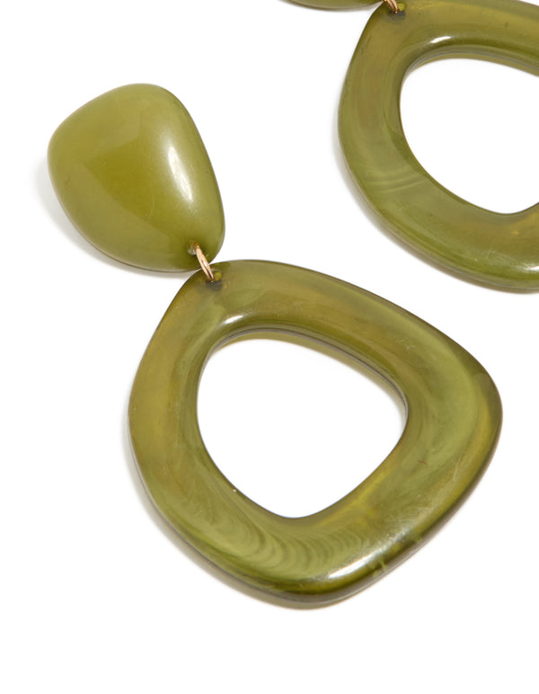Featuring organic green acrylic open oval drop earrings with statement style in olive close up view