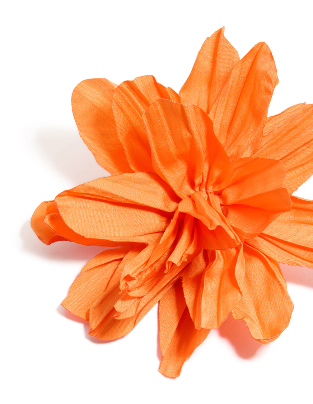 Crafted from orange paper with flower petal these statement floral earrings close up view