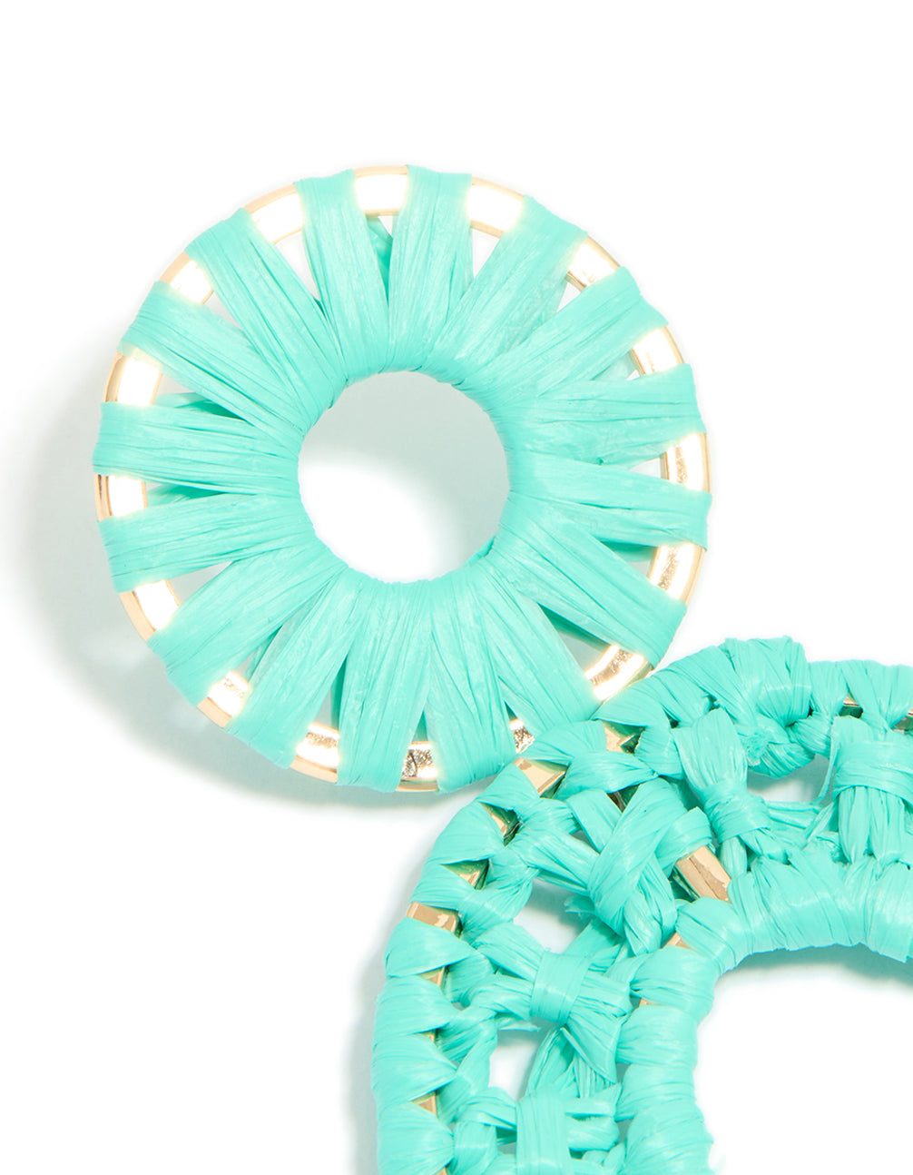 Displaying aqua blue paper patterned oval drop earrings in medium turquoise and gold close up view