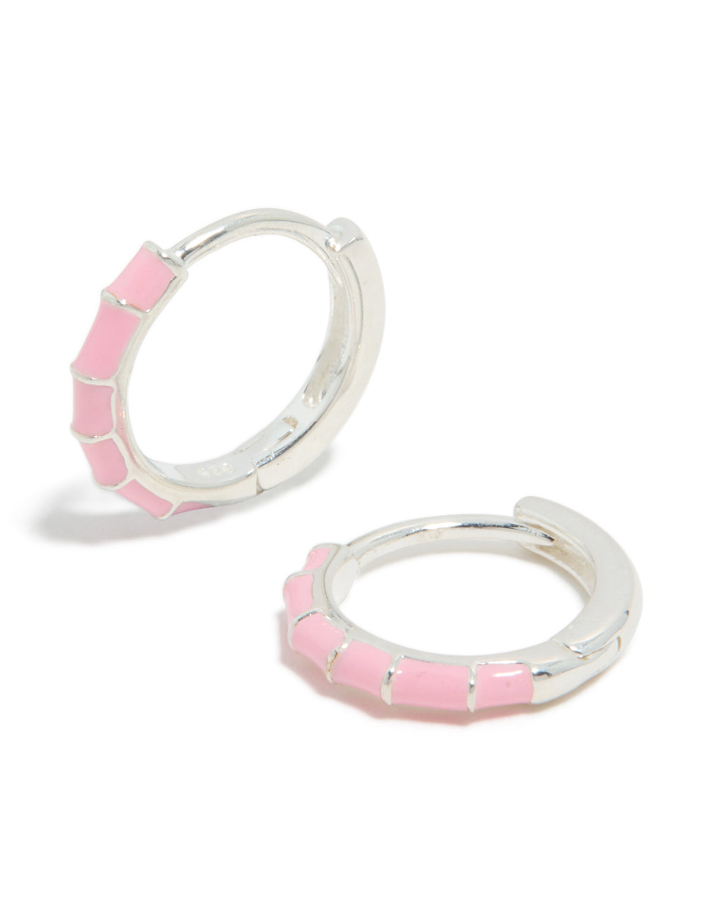 Beautifully crafted sterling silver pink enamel bamboo huggie earrings featuring hoop closure front view