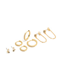 Showcasing a 4-pack of gold plated brass blue cubic zirconia evil eye chain and huggie earrings with crystal accents front view - link has visual effect only