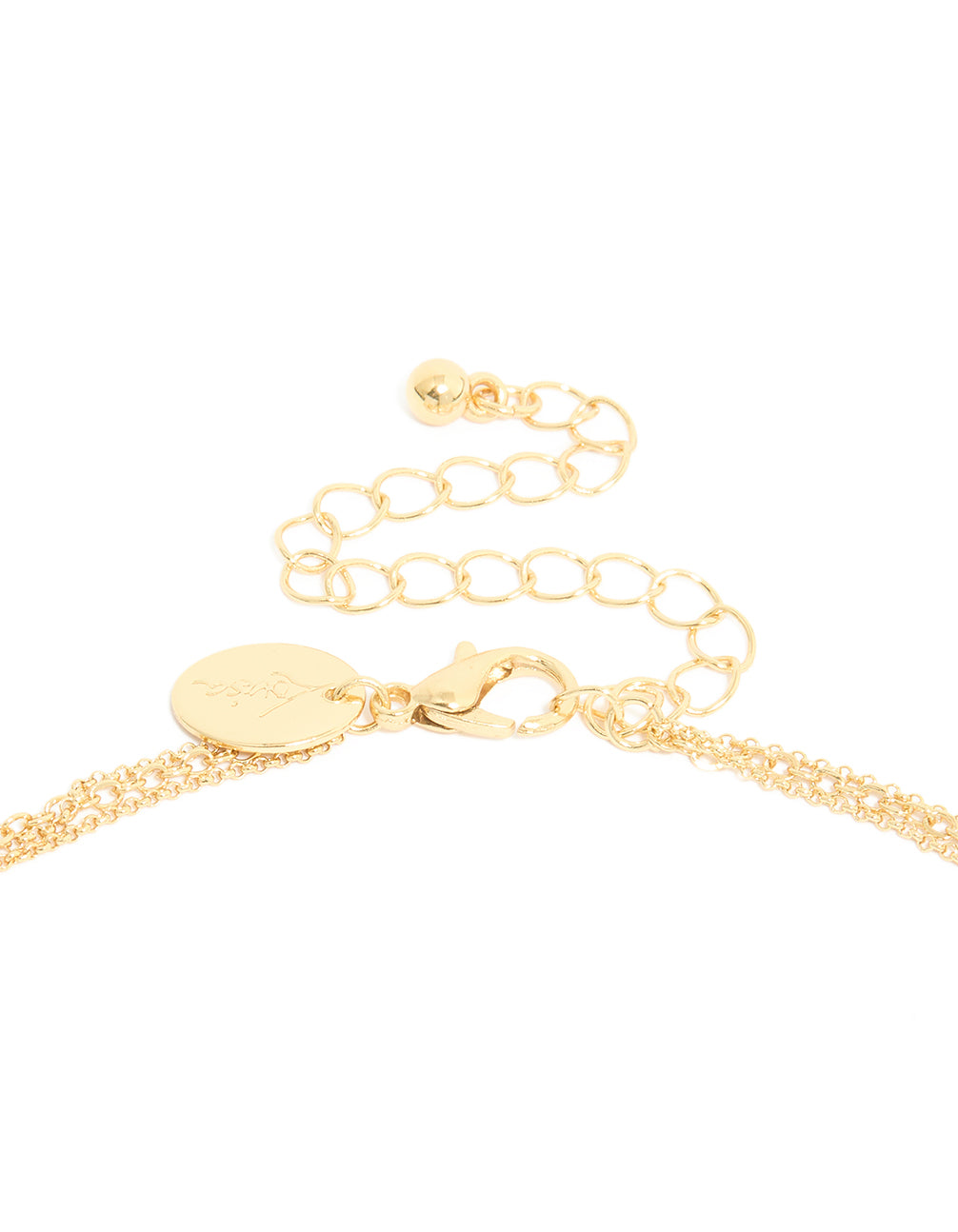 Elegant cross pendant with cubic zirconia bezel settings layered necklace in statement gold plated design clasp detail view