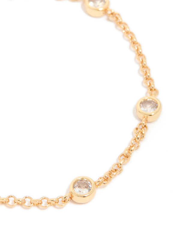 Highlighting gold plated cubic zirconia bezel set bracelet close up view