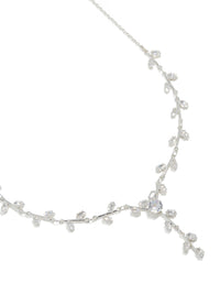 Showcasing a silver plated cubic zirconia dainty vine spaced necklace featuring leaf details close up view - link has visual effect only