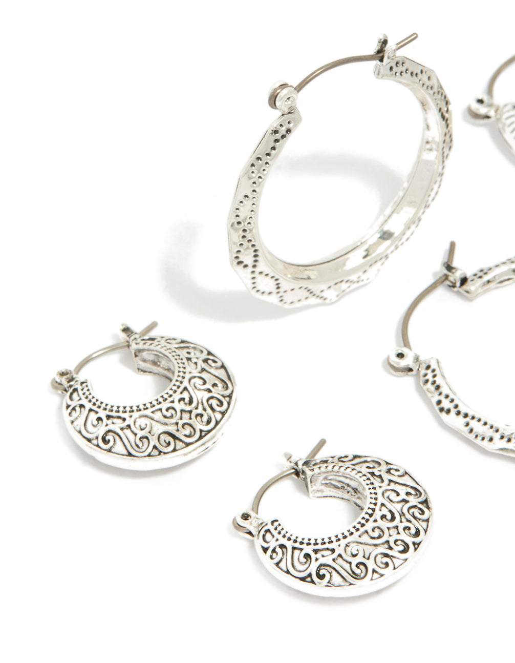 Featuring antique silver textured edged hoop earrings in a 3-pack with intricate detailing with a close up view