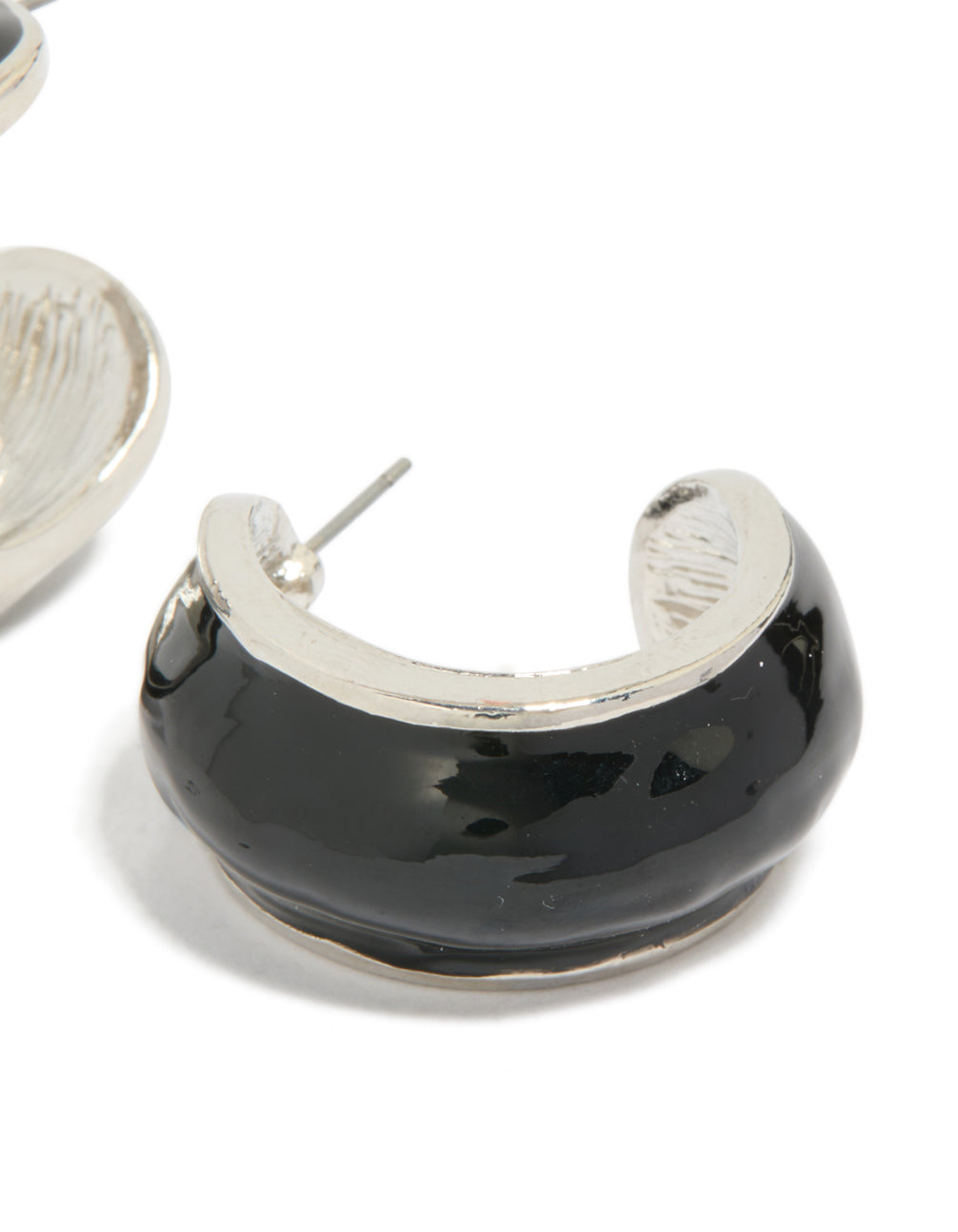 Crafted with silver black outer wide hoop earrings displaying post fastening mechanism post detail view