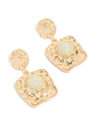 Crafted from gold with pale green stone, these statement drop earrings feature molten square design front view - link has visual effect only