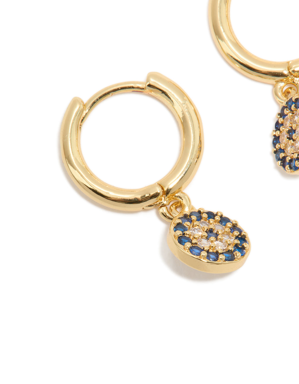 Featuring gold plated cubic zirconia evil eye circle huggie earrings with huggie closure close up view