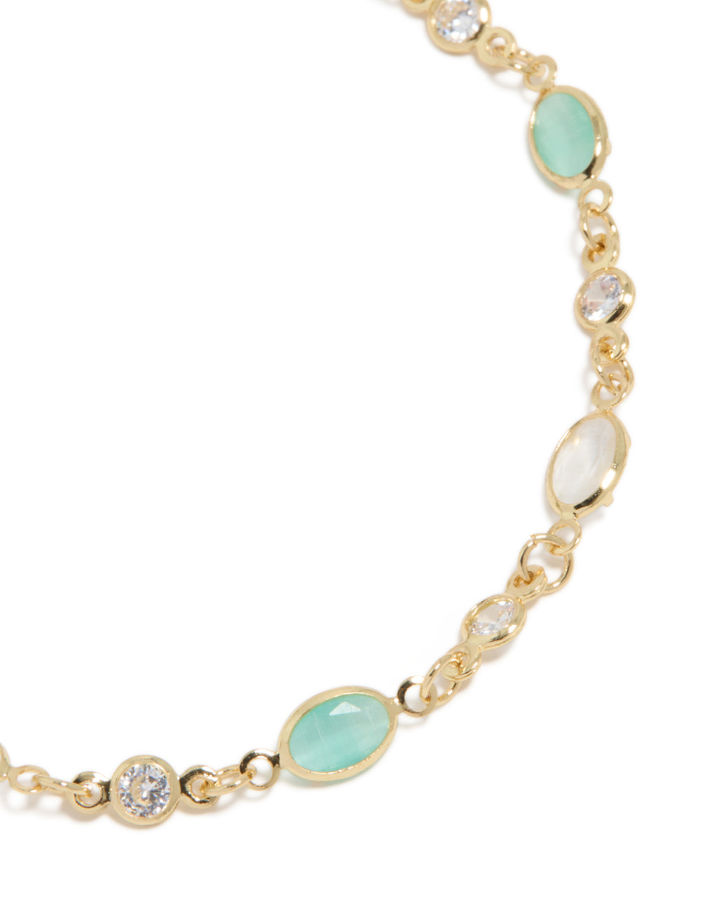 Elegant gold plated bracelet with clear and blue cubic zirconia in oval stone close up view