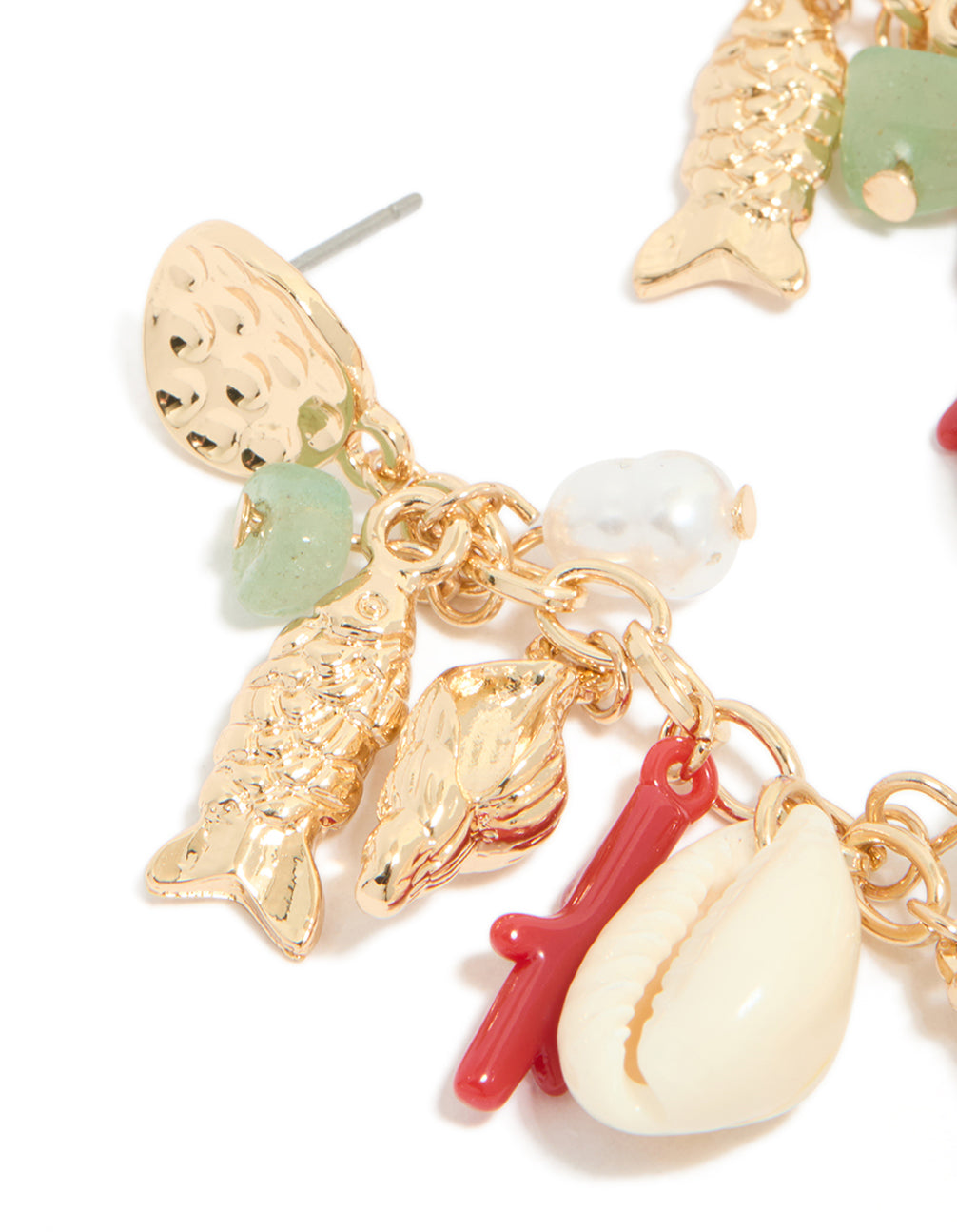 Shop gold fish drop earrings with ocean-inspired animal charms, shell accents, pearls, and beads in coral and mint cream in a close up view