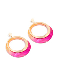 Showcasing gold two tone pink shell open disc drop earrings in a front view - link has visual effect only