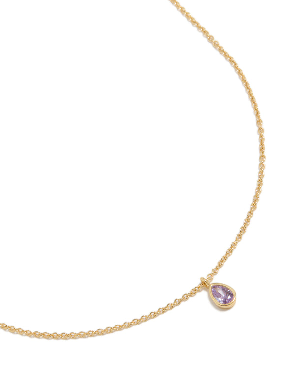 Showcasing a gold plated June birthstone necklace featuring cubic zirconia in a dainty style close up view