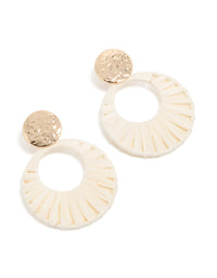 Showcasing statement drop earrings featuring gold hammered studs with white raffia paper circle drops in ivory and wheat tones front view - link has visual effect only