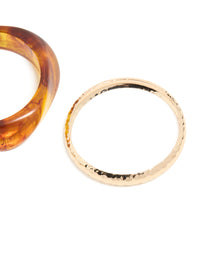 Crafted from gold and brown organic acrylic with orange tones bangle pack close up view - link has visual effect only