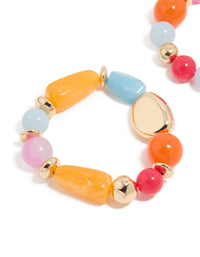 Highlighting acrylic beaded stretch bracelets with orange, pink, light blue, and gold accents in 2-pack close up view - link has visual effect only