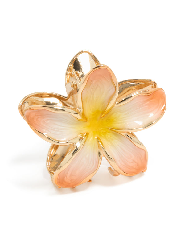 Featuring a floral enamel peach and yellow frangipani claw clip in gold side view