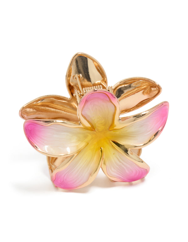 Stunning floral enamel frangipani claw clip featuring gold, pink, and yellow tones side view
