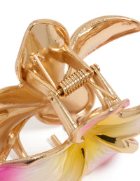 Elegant floral enamel frangipani claw clip with gold, pink, and yellow hues detail view - link has visual effect only