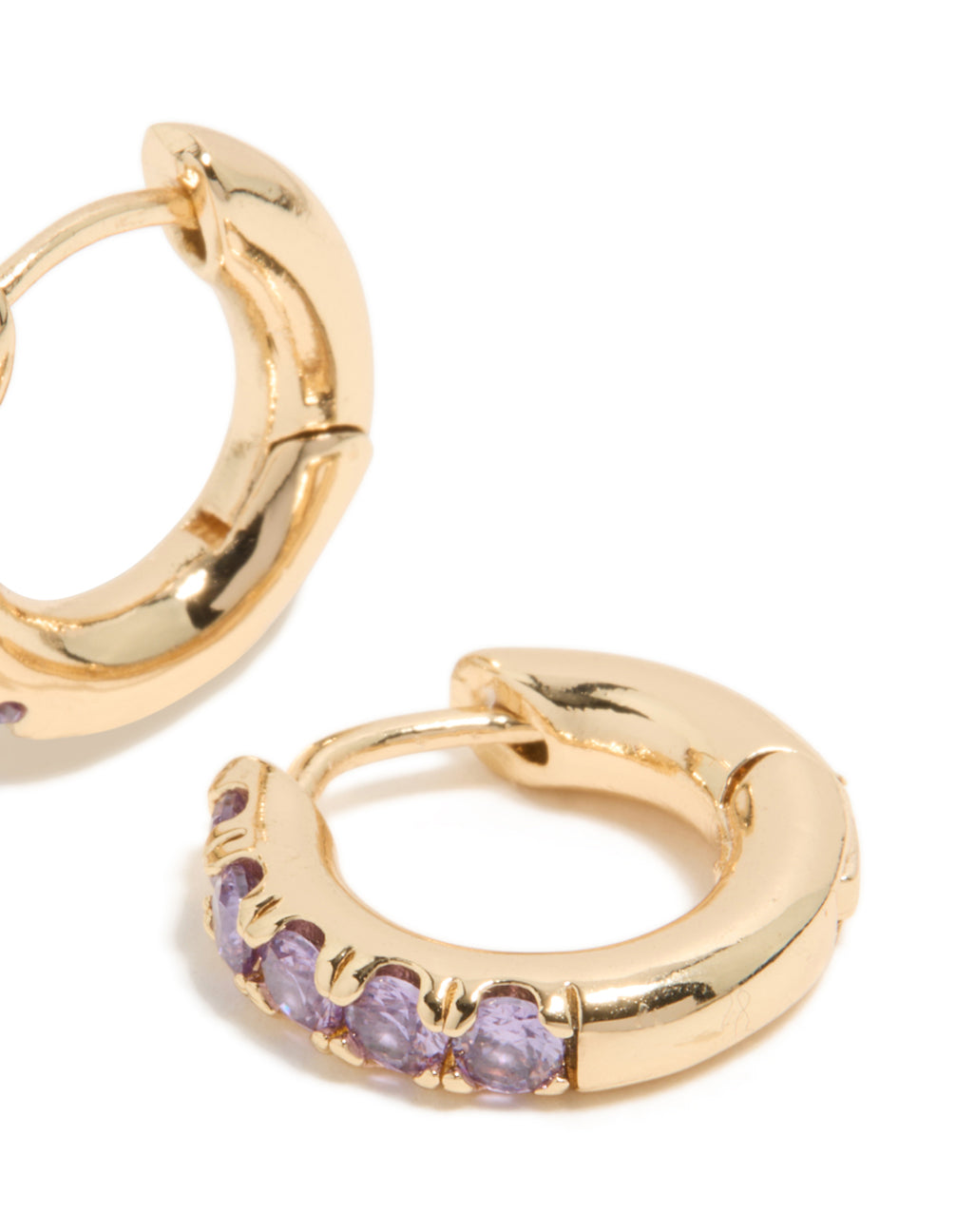 Stunning small clicker earrings in gold featuring light purple cubic zirconia with huggie closure post detail view