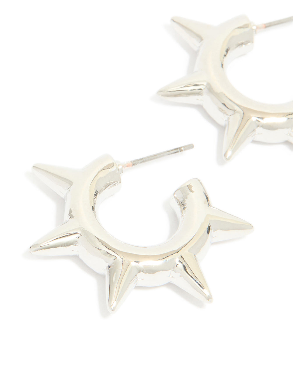 Crafted from statement spike hoop earrings in silver with closure detail close up view