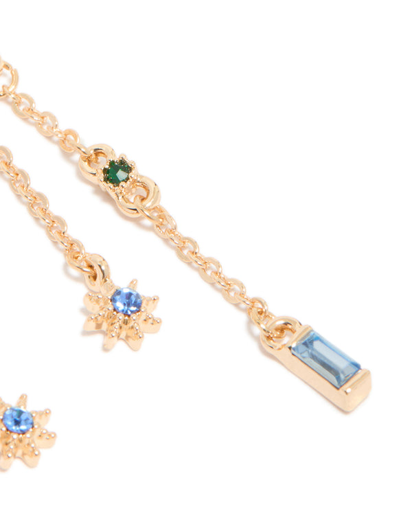 Elegant gold diamante star and moon chain drop earrings with celestial charm elements in blue and green post detail view