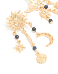 Crafted from gold, these statement drop earrings feature beads, celestial charms with sun and moon detailing close up view - link has visual effect only