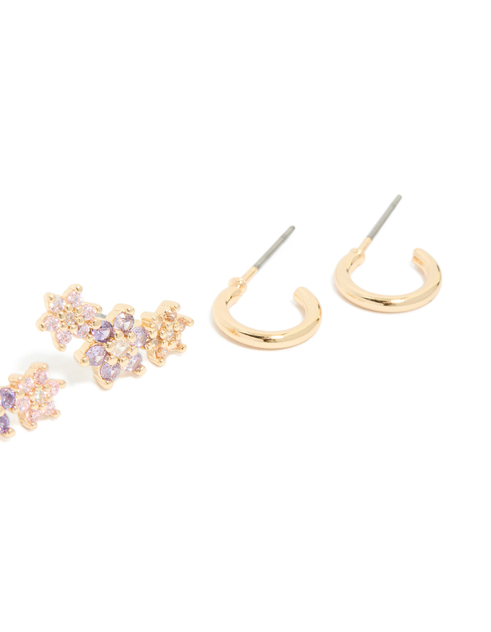 Crafted from gold cubic zirconia flower stud and hoop earrings in a 3-pack with floral pattern featuring crystal materials, lavender, light pink, & silver accents post detail view