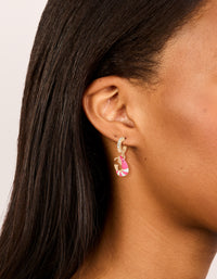 Showcasing gold diamante shrimp open huggie earrings featuring with ocean-inspired design in hot pink and white on ear view - link has visual effect only