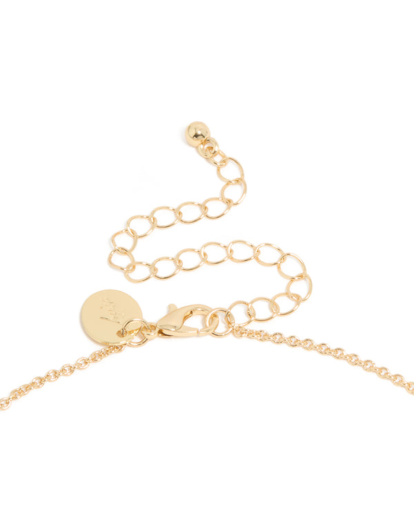 Highlighting rosary necklace designed with cross, pearl and cubic zirconia, in gold plated clasp detail view