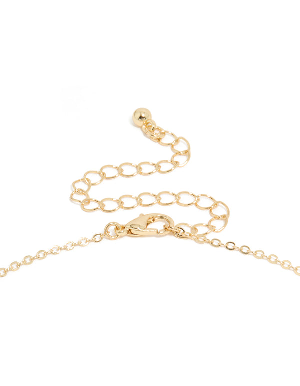 Highlighting the lobster clasp closure detail on a statement rosary necklace featuring a cross design, clasp detail view