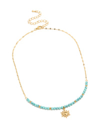 Designed with waterproof gold plated stainless steel, turquoise semi precious stone sunburst pendant necklace featuring beads and celestial in gold front view - link has visual effect only