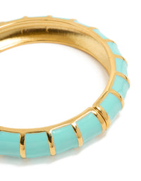 Explore this waterproof ribbed blue enamel bangle crafted from stainless steel with gold plating close up view - link has visual effect only
