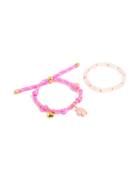 Featuring waterproof gold plated stainless steel semi precious stone and sea cord bracelets in a 2-pack with beads, heart and ocean charm, rose quartz accents, front view - link has visual effect only