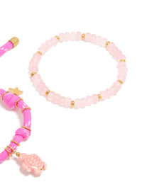Crafted from waterproof gold plated stainless steel semi precious stone and sea cord bracelets in a 2-pack with beads, heart and ocean charm, rose quartz accents closure detail view - link has visual effect only