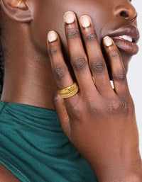 Featuring waterproof gold plated stainless steel plain and ribbed rings in a 2-pack on finger view - link has visual effect only
