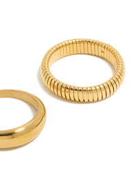 Designed with waterproof gold plated stainless steel plain and ribbed rings in a 2-pack close up view - link has visual effect only