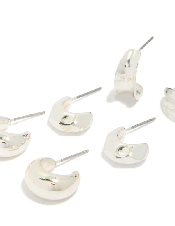 Featuring silver bubble concave huggie earrings in 3-pack close up view